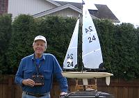 Joe with his remote controlled Thunder Tiger Victoria sailboat.